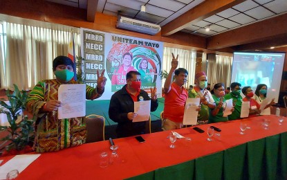 <p><strong>UNITEAM SUPPORTERS.</strong> Lawyer Diosdado Padilla (3rd from left) leads the declaration of support of the Movement for Reform and Regional Development toward New Economic Cultural Cooperation for the UniTeam tandem of presidential aspirant Ferdinand Marcos Jr. and running mate, Sara Duterte, at the Aberdeen Court, Quezon City on Friday (March 18, 2022). The multi-discipline group also backed the candidacy of President Rodrigo Duterte in the 2016 elections.<em> (PNA photo by Lade Kabagani)</em></p>