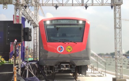<p><strong>LONGEST TRAIN SET.</strong> The Philippines' first 8-car electric set, which is 160 meters long, is unveiled by the Department of Transportation (DOTr) in Valenzuela City on Friday (March 18, 2022). The DOTr said it is the longest electronic train set in the country. <em>(Photo courtesy of People's Television Network)</em></p>