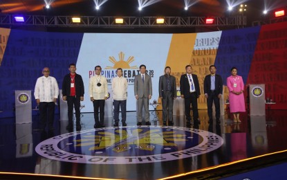 <p><strong>READY.</strong> The nine presidential candidates pose for posterity before the start of the Commission on Elections' "PiliPinas Debates 2022" at the Harbor Garden Tent of Sofitel Philippine Plaza Hotel in Pasay City on Saturday (March 19, 2022). They are (from left) Ernesto Abella, Leody de Guzman, Manila Mayor Isko Moreno, Norberto Gonzales, Senator Panfilo Lacson, Faisal Mangondato, Dr. Jose Montemayor Jr., Senator Manny Pacquiao, and Vice President Leni Robredo.<em> (PNA photo by Avito Dalan)</em></p>