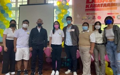 <p><strong>SPECIAL GUEST.</strong> Baguio City Mayor Benjamin Magalong Jr. (3rd from left) attends an event of Kabataan party-list, a suspected recruiter of students into the communist movement, in this photo posted by the group on social media Saturday (March 19, 2022). The group thanked Magalong for banning so-called red-tagging posters in the city. <em>(Photo courtesy of Kabataan Party-list Facebook)</em></p>