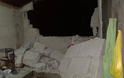 <p><strong>QUAKE-HIT.</strong> A portion of this house is damaged by a magnitude 5.3 earthquake early Monday (March 21, 2022) in Tagadtaran village in Burauen, Leyte. The temblor struck 10 kilometers southwest of Burauen town in Leyte at 12:39 a.m. <em>(Photo courtesy of Jae Abio Estrella)</em></p>