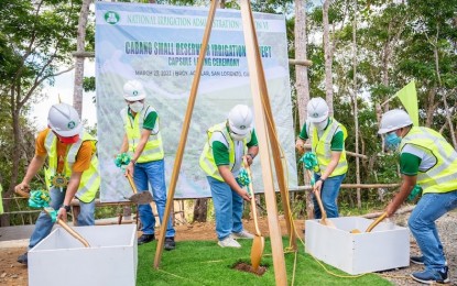 <p><strong>GROUNDBREAKING. </strong>The National Irrigation Administration (NIA) breaks the ground for the PHP875-million small reservoir irrigation project in Guimaras on Wednesday (March 23, 2022). Joining the ground-breaking and lowering of the time capsule were (left to right) Guimaras Federation of Communal Irrigators Association president Marvin Villanueva, NIA Deputy Administrator for Administrative and Finance Sector Ralph Lauren Du, NIA Administrator retired Gen. Ricardo Visaya, NIA Region VI Regional Manager Engr. Rory Avance, and Iloilo-Guimaras Irrigation Management Office Division Manager, Engr. Randy Alipis. <em>(Photo courtesy of JR Laluma Sr./NIA Region VI) </em></p>