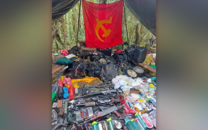 <p><strong>SEIZED WAR MATERIEL.</strong> The high-powered firearms and other materiel seized by government forces after an encounter with New People's Army rebels in Sitio Montenegren, Barangay San Isidro, Marihatag, Surigao del Sur on March 21, 2022. Killed during the skirmish was an NPA rebel whose identity is still being determined by authorities. <em>(Photo courtesy of 4ID)</em></p>