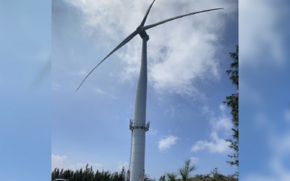 <p><strong>POWER RATE</strong>. Giant wind energy turbines are scattered across Ilocos Norte, like this one in Barangay Caparispisan, Pagudpud, yet the province has the most expensive electricity rate in the country, according to local power consumers. On Thursday (July 21, 2022), residents took to the streets to express their discontent with the high electricity rates in the province. <em>(File photo by Leilanie Adriano)</em></p>