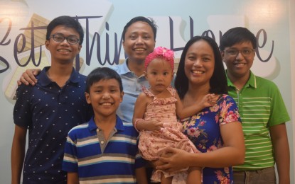 <p><strong>LEARNING FROM ADOLESCENCE</strong>. Maria Kenneth Agtarap, a 38-year-old mother from Cavite, smiles with her husband, three sons, and a toddler daughter in this undated photo. Agtarap shared her experiences and strategies in raising adolescents in a pandemic setup, in time for the celebration of International Adolescents Health Week. <em>(Courtesy: Maria Kenneth Agtarap)</em></p>