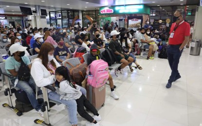 <div><span style="color: #000000; font-family: arial, sans-serif;"><strong>BACK IN OPERATION</strong>. Domestic passengers flock to the NAIA Terminal 4 on Monday (March 28, 2022) on the first day of its reopening after almost two years due to the pandemic. There are 106 flights scheduled to depart and arrive at Terminal 4. (<em>Photo courtesy of Manila International Airport Authority</em>) </span></div>