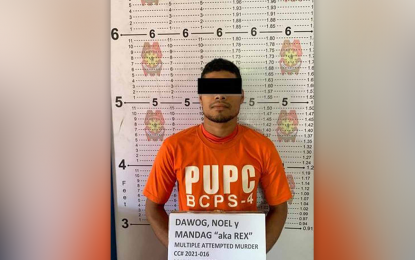 <p><strong>NABBED REBEL.</strong> Butuan City police officers arrest Noel M. Dawog, alias Rex, 30, an insurgent under the North Eastern Mindanao Regional Committee of the New People's Army in Barangay Anticala, Butuan City Tuesday (March 29, 2022). Dawog is facing criminal charges for multiple attempted murder. <em>(Photo courtesy of Butuan City Police Office)</em></p>