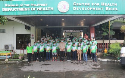 <p><strong>HAPPY TO HELP.</strong> Members of the volunteer medical team from the Bicol Medical Center meet with Department of Health-Bicol Regional Director Dr. Ernie V. Vera (center) before their deployment to the Caraga region which bore the brunt of Typhoon Odette in December last year. The team will stay on Dinagat Island until April 24, 2022. <em>(Photo from DOH-5's Facebook page)</em></p>