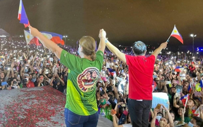 <p><strong>CROWD DRAWER</strong>. Presidential aspirant Ferdinand “Bongbong” Marcos Jr. and vice presidential candidate Sara Duterte draw an estimated 120,000 crowd during a grand rally in Digos City on Wednesday night (March 30, 2022). Marcos and Duterte enjoyed high voter preference in Mindanao, according to the latest Pulse Asia survey. <em>(Photo from UniTeam BBM-Sara Facebook page)</em></p>