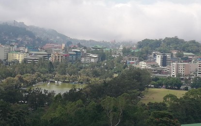 <p><strong>DECONGEST CITY CENTER.</strong> Undated photo shows Burnham Park in Baguio City with the central business district (CBD) serving as a backdrop, which the local government plans to decongest by developing six nearby growth nodes. Aileen Refuerzo, city chief information officer, on Monday (April 4, 2022) said that while new economic areas will soon rise, the CBD will remain the prime commercial and institutional center. <em>(PNA photo by Liza T. Agoot)</em></p>
