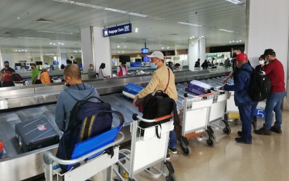 <p><strong>TRAVEL DEMAND UP. </strong>Travelers at the Ninoy Aquino International Airport in this undated photo. Korean Air and Cebu Pacific on Tuesday (Nov. 14, 2023) expressed optimism that the rise in demand for travel would continue until the fourth quarter of the year.  (<em>PNA file photo by Cristina Arayata</em>) </p>