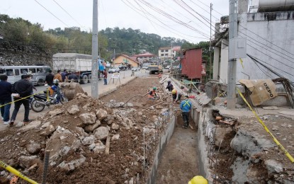 <p><strong>RIGHT OF WAY.</strong> The Baguio city government starts recovering a part of the Naguilian Road encroached by establishments in this undated photo. Mapping by the city government found that the city still needs to recover the rights of way from over 1,000 public and private structures that have encroached on several local and national roads. <em>(File photo by Neil Clark Ongchangco/Baguio PIO)</em></p>