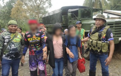 <p><strong>PEACEFUL SURRENDER.</strong> Three New People’s Army (NPA) fighters surrender to the Philippine Army’s 60th Infantry Battalion on Tuesday (April 5, 2022) in Barangay Gupitan, Kapalong, Davao del Norte. The rebels said they suffered from persistent lack of food and other essential supplies. <em>(Photo courtesy of 60IB)</em></p>
