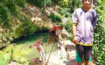 <p><strong>URBAN GARDENING.</strong> Baguio resident Michael Caluza shows his urban garden at the Mines View Park in this file photo last March. The city government has encouraged residents to do backyard gardening, either for personal use or for livelihood, to promote food security. <em>(File photo courtesy of BCVOAS FB)</em></p>