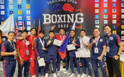 <p><strong>THAILAND OPEN CAMPAIGNERS.</strong> Members of the Philippine boxing team pose for posterity after winning three gold and two silver medals in the 2022 Thailand Open International Boxing Tournament that ended on Saturday (April 9, 2022) at the Angsana Laguna Phuket Resort Hotel. From left: Roel Velasco (coach), Mitchel Martinez (coach), Hergie Bacyadan, Aira Villegas, Riza Pasuit, Reynaldo Galido (coach), Rogen Ladon, Ian Clark Bautista, Don Abnett (coach), Marcus Manalo (ABAP secretary-general). <em>(Photo courtesy of ABAP secretary-general Marcus Manalo)</em></p>