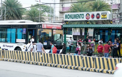 <p><strong>MORE FREE RIDES.</strong> Passengers queue at the Monumento-Edsa Carousel bus station in Caloocan City on April 11. Commuters along Edsa will continue to enjoy the 'Libreng Sakay (free ride)' program until July 31 despite the end of the Service Contracting Program this June according to the Land Transportation Franchising and Regulatory Board on Wednesday (June 22, 2022).<em> (PNA photo by Ben Briones)</em></p>