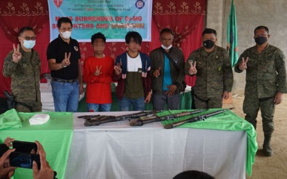 <p><strong>YOUNG COMBATANTS.</strong> Two minor combatants (3rd and 4th from left) and 49 supporters and couriers of the Dawlah Islamiya surrender to military authorities Monday (April 11, 2022) in the Lanao del Sur town of Piagapo. Each of them received food packs as initial assistance from the government. <em>(Photo courtesy of Western Mindanao Command Public Information Office)</em></p>