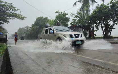 <p><strong>STORMY WEATHER</strong>. Flooding along Antique road due to heavy rainfall caused by Tropical Depression Agaton as of Tuesday (April 12,2022). Antique Provincial Disaster Risk Reduction and Management Officer Broderick Train said classes and government work were suspended due to the heavy rainfall and flooding. <em>(Photo courtesy of Antique PIO)</em></p>