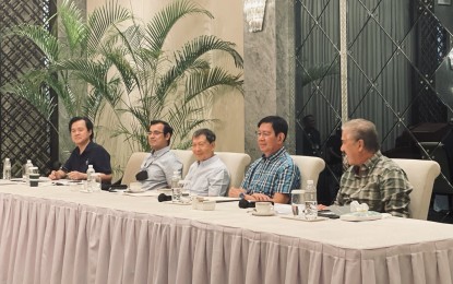 <p><strong>ON WITH THE RACE.</strong> Presidential candidates Francisco "Isko Moreno" Domagoso (2nd from left), Panfilo "Ping" Lacson (2nd from right), and Norberto Gonzales (center) vow to continue their bid for the country's top post in a press briefing in Makati City on Sunday (April 17, 2022). The three claimed they were urged to withdraw from the presidential race as an "ultimate sacrifice" in favor of Vice President Leni Robredo. <em>(PNA photo by Robert Oswald Alfiler)</em></p>