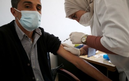 <p><strong>NO NEW COVID-19 CASE</strong>. A man receives a dose of Covid-19 vaccine in Algiers, Algeria, on Jan. 17, 2022. The Algeria Health Ministry reported no new daily Covid-19 case for the first time since the outbreak of the diseases two years ago. <em>(Xinhua photo)</em></p>