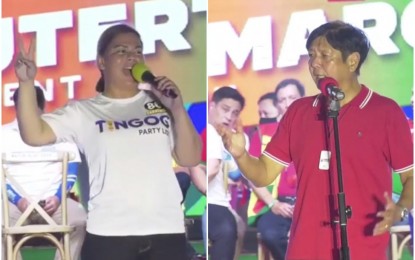 <p><strong>CEBU CAMPAIGN.</strong> Vice presidential aspirant and Davao City Mayor Sara Duterte (left) and presidential bet Ferdianand "Bongbong" Marcos Jr. deliver their speeches during the festival-like UniTeam rally at the Filinvest field in Cebu City's South Road Properties on Monday night (April 18, 2022). Marcos vowed to make internet service cheaper by improving the country's digital infrastructure, as he and Mayor Duterte pledged to continue the programs of President Rodrigo Duterte. <em>(Contributed photo)</em> </p>