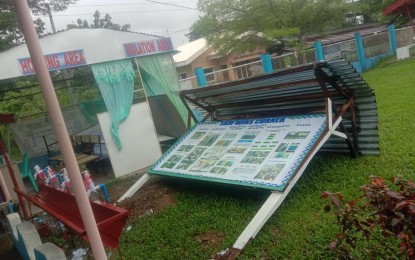 <p><strong>DAMAGED BY AGATON</strong>. Tropical Depression Agaton wrecks a portion of the Lipata Integrated School in the municipality of Barotac Viejo in Iloilo. DepEd Western Visayas information officer Hernani Escullar Jr. said on Tuesday (April 19, 2022) that based on the April 18 initial report of the Regional Disaster Risk Reduction Management Unit, "Agaton" has damaged 185 classrooms, 1,554 furniture, 602,725 learning references, and 214 computer equipment. <em>(PNA photo courtesy of DepEd Western Visayas regional office)</em></p>
