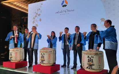 <p><strong>NEW HOTEL IN TOWN.</strong> Tourism Secretary Bernadette Romulo-Puyat (4th from left) graces the opening of the Japanese luxury hotel, Hotel Okura, at the Resorts World complex in Newport City on Tuesday (April 19, 2022). With her are (from left) Chief Gaming Officer Hakan Dagtas, Pasay City Mayor’s chief of staff Peter Eric Pardo, Resorts World Manila president and CEO Kingson Sian, Travellers International Hotel Group, Inc. chairman Kevin Tan, Embassy of Japan Deputy Chief of Mission and Minister Yasushi Yamamoto, Hotel Okura president Toshihiro Ogita, and Hotel Okura Manila general manager Jan William Marshall. <em>(PNA photo)</em></p>