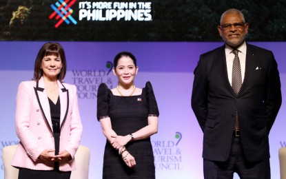 <p><strong>PH TOURISM.</strong> (L-R) World Travel & Tourism Council (WTTC) President Julia Simpson, Department of Tourism Secretary Bernadette Romulo-Puyat, and World Travel & Tourism Council (WTTC) Chairman Arnold Donald pose for posterity during the kickoff of the annual WTTC Global Summit at the Marriott Hotel in Pasay City on Wednesday (April 20, 2022). WTTC said the Philippine tourism industry is "firmly" on the road to recovery.<em> (PNA photo by Joey O. Razon)</em></p>