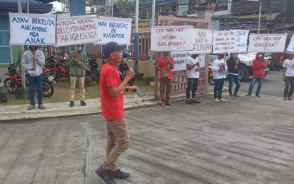 <p><strong>INSURGENCY-FREE</strong>. Former members of the New People's Army hold a peace rally Wednesday (April 20, 2022) expressing support for the peace campaign of the military in Zamboanga del Norte. The province has been declared insurgency-free after the Army's 102nd Infantry Brigade successfully dismantled the last NPA guerrilla front in the area earlier this month. <em>(Photo courtesy of the 102IB)</em></p>