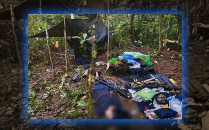 <p><strong>ENCOUNTER CASUALTY.</strong> A body of a New People’s Army combatant lies on the ground along with the seized items from a group of rebels following an encounter in Malaybalay City, Bukidnon, on April 18, 2022. The Army's 4th Infantry Division, which released the photo Friday (April 22, 2022), says its units also managed to retrieve several firearms from the NPA in Bukidnon province and the Caraga Region. <em>(Photo courtesy of 4ID)</em></p>