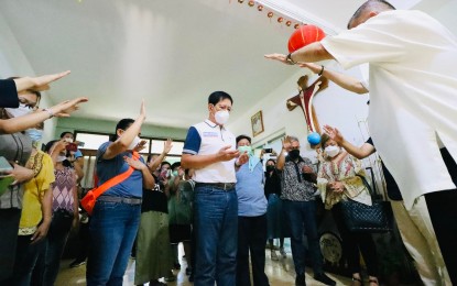 <p><strong>BLESSED.</strong> Bangued Bishop Leopoldo Jaucian (right) and supporters pray over Senator Panfilo Lacson in Abra province on Tuesday (April 26, 2022). Lacson thanked Jaucian for the blessing and said he is one with them in praying for the eventual end of the Covid-19 pandemic. <em>(Photo courtesy of Sen. Lacson Facebook)</em></p>