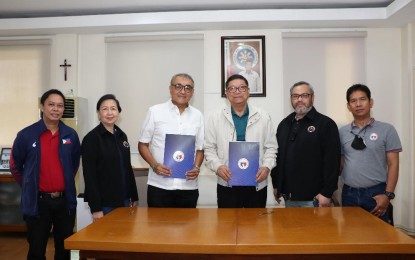 <p><strong>SPORTS PARTNERSHIP.</strong> Officials of the Philippine Sports Commission and University of Mindanao sign a memorandum of understanding for grassroots sports development at the Rizal Memorial Sports Complex in Manila on Tuesday (April 26, 2022).(From left to right) PSC Commissioner Charles Raymond Maxey, Commissioner Celia Kiram, University of Mindanao president Dr. Guillermo Torres Jr., PSC Chairman William "Butch" Ramirez, Executive Director Guillermo Iroy Jr. and Commissioner Arnold Agustin.<em> (Photo courtesy of PSC)</em></p>