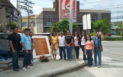 <p><strong>LIBERATION DAY</strong>. REDSHIELD members and some of their kin unveil the reconstructed South Liberation Marker on Tuesday (April 26, 2022) in Dumaguete City. The REDSHIELD, an exclusive group of current and alumni officers of Silliman University's Reserve Officers Training Corps (ROTC), paid tribute to the late Maj. Galicano Sibala and his courageous men, who, along with other veterans, fought the Japanese forces 77 years ago.<em> (Photo courtesy of Sidney Lee)</em></p>