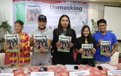 <p><strong>REDEMPTION.</strong> A group of former New People’s Army rebels launches the book “Unmasking: The Myth of Communism in the Philippines” in Davao City Thursday (April 28, 2022). The book is a compendium of firsthand accounts and analyses from former cadres of the communist rebel organization.<em> (Photo by Robinson Niñal)</em></p>