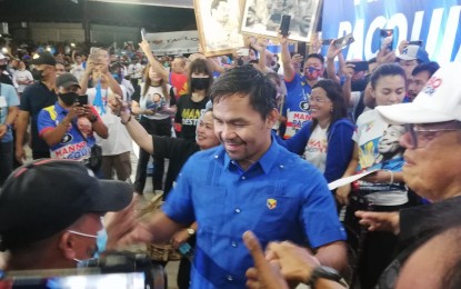 <p><strong>PRO-POOR</strong>. Presidential aspirant Senator Manny Pacquiao during a campaign sortie in Tacloban City on the night of April 27, 2022. The boxing icon called for a “revolution” against poverty as he asked voters to give him a chance to lead the country in the next six years. <em>(PNA photo by Sarwell Q. Meniano)</em></p>
