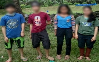 <p><strong>RESCUED YOUNG REBELS.</strong> Four teenaged New People's Army rebels surrender to the Army's 66th Infantry Battalion in Maragusan, Davao de Oro, Wednesday (April 27, 2022). Since 2016, the Army's 10th Infantry Division recorded at least 121 rescued minors from the NPA.<em> (Photo courtesy of 10ID)</em></p>