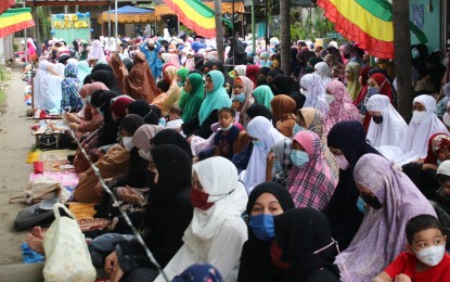 <p><strong>FEAST.</strong> Muslims celebrate Eid al-Fitr, the festival ending Ramadan, at the Ecoland Mosque (Jamjom Masjid) in Davao City on Monday (May 2, 2022) morning. More gatherings are expected Tuesday which has been declared a non-working holiday nationwide. <em>(PNA photo by Robinson Niñal Jr.)</em></p>