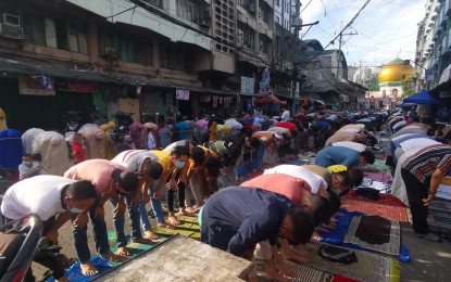 <div class="caption">
<p><strong>HOLY DAY.</strong> Filipino-Muslims perform in unison a Salat al-Eid or Eid prayer near the Golden Mosque in Quiapo, Manila on Monday (May 2, 2022). The month-long Ramadan of fasting and praying has ended.<em> (PNA photo by Avito Dalan)</em></p>
</div>