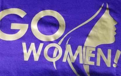 <p><strong>GO WOMEN</strong>. The campaign logo used by women protection advocates is printed on this Presidential Communication Operations Office shirt in Baguio City March 2018. The city government has raised concern over the 29 documented cases of violence against women and their children in the first quarter of 2022. <em>(PNA photo by Liza T. Agoot)</em></p>