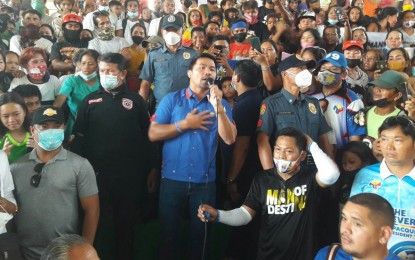 <p><strong>CEBU SORTIE.</strong> Presidential candidate, Senator Manny Pacquiao speaks with his supporters before a grand caravan to Cebu's southern towns on Wednesday (May 4, 2022) as a prelude to his three-day sortie that will end at a grand rally in Cebu City on May 6. Another presidential bet, Manila Mayor Francisco "Isko Moreno" Domagoso was also in Cebu City for a town-hall meeting, while a daughter of presidential candidate, Vice President Leni Robredo, campaigned at a market in Lapu-Lapu City.<em> (Photo courtesy of John Henry Delfino)</em></p>