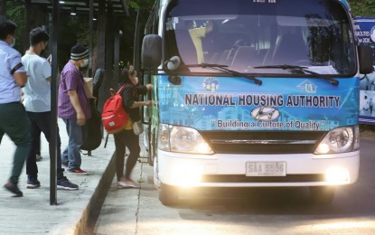 <p><strong>FRESH START</strong>. Balik Probinsya program beneficiaries are all set to return to their province, onboard a National Housing Authority bus at the BP2 Depot in Quezon City on Thursday morning (May 5, 2022). Two families will return to Siquijor and start life anew in the province. <em>(PNA photo by Robert Oswald P. Alfiler)</em></p>