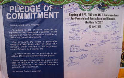 <p><strong>PEACEFUL ELECTIONS.</strong> The Office of the Presidential Adviser on Peace, Reconciliation and Unity (OPAPRU), Moro Islamic Liberation Front (MILF), and the Armed Forces of the Philippines (AFP) sign a “Pledge of Commitment” on April 30, to ensure clean, orderly, and peaceful election in BARMM. The OPAPRU said on Thursday (May 5, 2022) the signing of the pact is another major milestone in the Bangsamoro peace process. <em>(Photo courtesy of OPAPRU)</em></p>