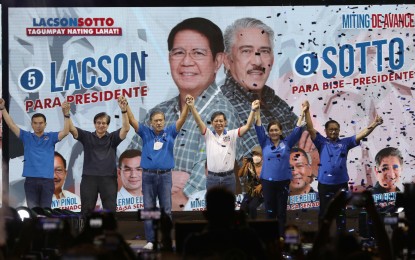 <p><strong>MITING DE AVANCE</strong>. Presidential candidate, Senator Panfilo “Ping” Lacson, and his vice-presidential running mate, Senate President Vicente “Tito” Sotto III (4th and 3rd from left, respectively) raise the hands of their senatorial candidates during their grand rally at the Verdant Square in Lacson’s home province of Cavite on Friday night (May 6, 2022). Lacson reminded voters of the province's role as the birthplace of the republic and urged them to be patriotic reformers by choosing a worthy leader. <em>(PNA photo by Joey Razon)</em></p>