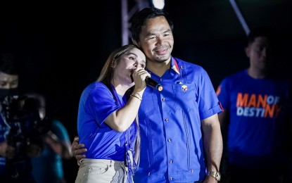 <p><strong>BIGGEST SUPPORTER. </strong>Presidential aspirant Senator Manny Pacquiao listens as his wife, Jinkee, serenades the crowd at the North Reclamation Area, Cebu City on Friday night (May 6, 2022). Pacquiao is confident poor Filipinos will vote for him on Monday. <em>(Photo courtesy of Manny Pacquiao Facebook)</em></p>