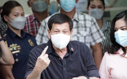 <p><strong>PRIVATE CITIZEN.</strong> President Rodrigo Duterte cast his vote Monday (May 9, 2022) in Davao City, where he thanked Dabawenyos for propelling him to the country's highest office. In a short speech, Duterte says he will remain as a public servant after his return to civilian life.<em> (Photo courtesy of Armando Fenequito, Radyo Pilipinas 1 Davao)</em></p>