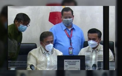 <p><strong>CANVASSING MACHINES</strong>. Senate President Vicente Sotto III and Speaker Lord Allan Velasco lead the initialization of the vote consolidation and canvassing system (CCS) machine at the House of Representatives at Batasang Pambansa in Quezon City on Monday (May 9, 2022). The CCS machine will be used to receive the transmission of the Certificates of Canvass (COCs) from all over the country. <em>(Screengrab)</em></p>