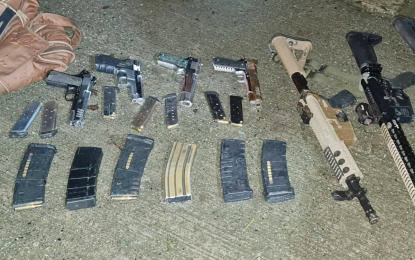 <p><strong>HIGH-POWERED GUNS.</strong> Some of the high-powered firearms that authorities seize following an operation on Sunday and Monday in the Surigao del Norte town of Malimono. Police and military personnel arrest 12 persons. <em>(Photo courtesy of the Surigao del Norte Police Office)</em> <br /><br /><br /></p>