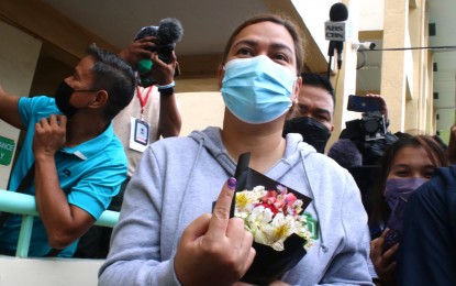 <p><strong>LOYAL, SUPPORTIVE.</strong> Vice presidential aspirant and Davao City Mayor Sara Z. Duterte shows her index finger after voting at Daniel R. Aguinaldo National High School in Davao City Monday (May 9, 2022). If she wins the elections, Duterte vowed to be a loyal and supportive vice president.<em> (PNA photo by Robinson Niñal Jr.)</em></p>