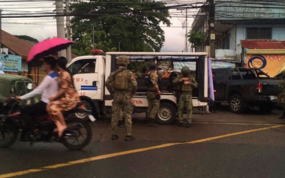 <p><br /><strong>EXPLOSION.</strong> Police and soldiers respond to an explosion on a road near the Kabacan Central Pilot Elementary School in North Cotabato while voting is ongoing at the learning facility Monday (May 9, 2022). Voting continued after the incident. <em>(Photo courtesy of Kabacan MPS)</em></p>