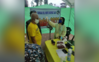 <p><strong>RIGHT OF SUFFRAGE.</strong> A person deprived of liberty or PDL is checked before casting his vote in a Bureau of Jail Management and Penology (BJMP) facility in Surigao City on Monday (May 9, 2022). The BJMP in the Caraga Region reported that 560 PDLs cast their votes in the elections. <em>(Photo courtesy of BJMP-13)</em></p>